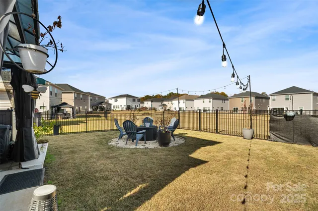 a view of a patio with swimming pool table and chairs