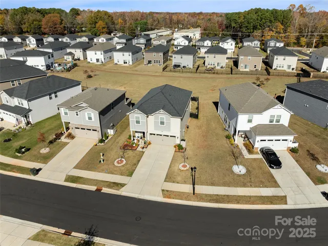 an aerial view of a livingroom with furniture