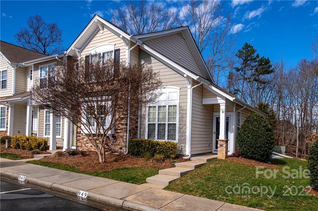 949 Copperstone Lane, Unit 203 Fort Mill, SC 29708 - Photo 1 of 19 a view of house with yard