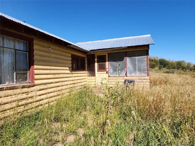 a room with furniture and window