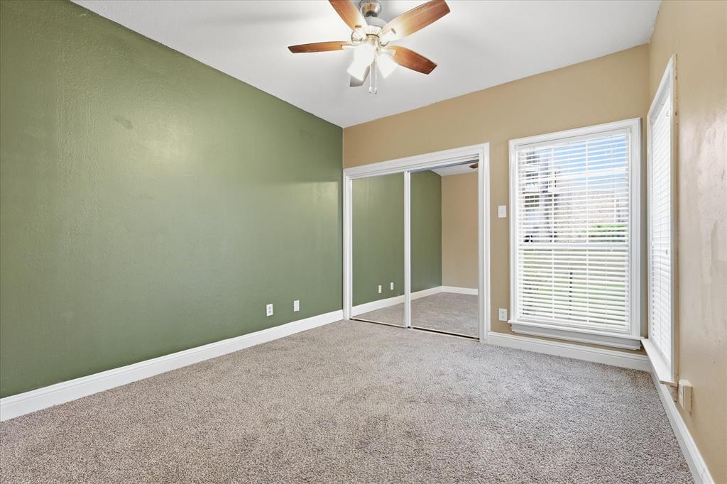 14277 Preston Road, Unit 615 Dallas, TX 75254 - Photo 17 of 20 a view of an empty room with a window