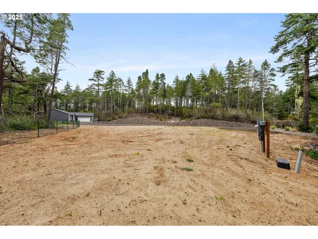 a backyard of a house with lots of green space