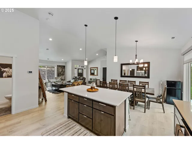 a view of a kitchen and dining room