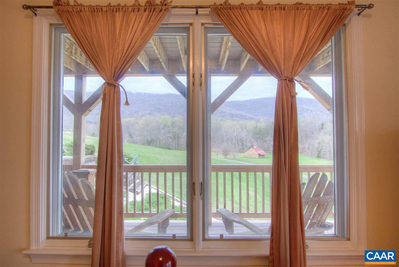 264 Twin Ridge Lane Afton, VA 22920 - Photo 19 of 49 a view of a room with wooden floor and outdoor view
