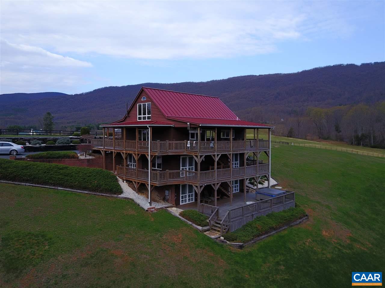 264 Twin Ridge Lane Afton, VA 22920 - Photo 2 of 49 a view of a house with a big yard and large trees