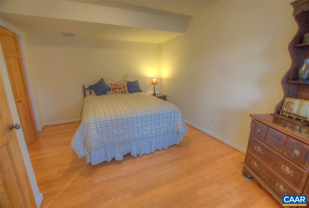 264 Twin Ridge Lane Afton, VA 22920 - Photo 25 of 49 a bedroom with a bed and a dresser