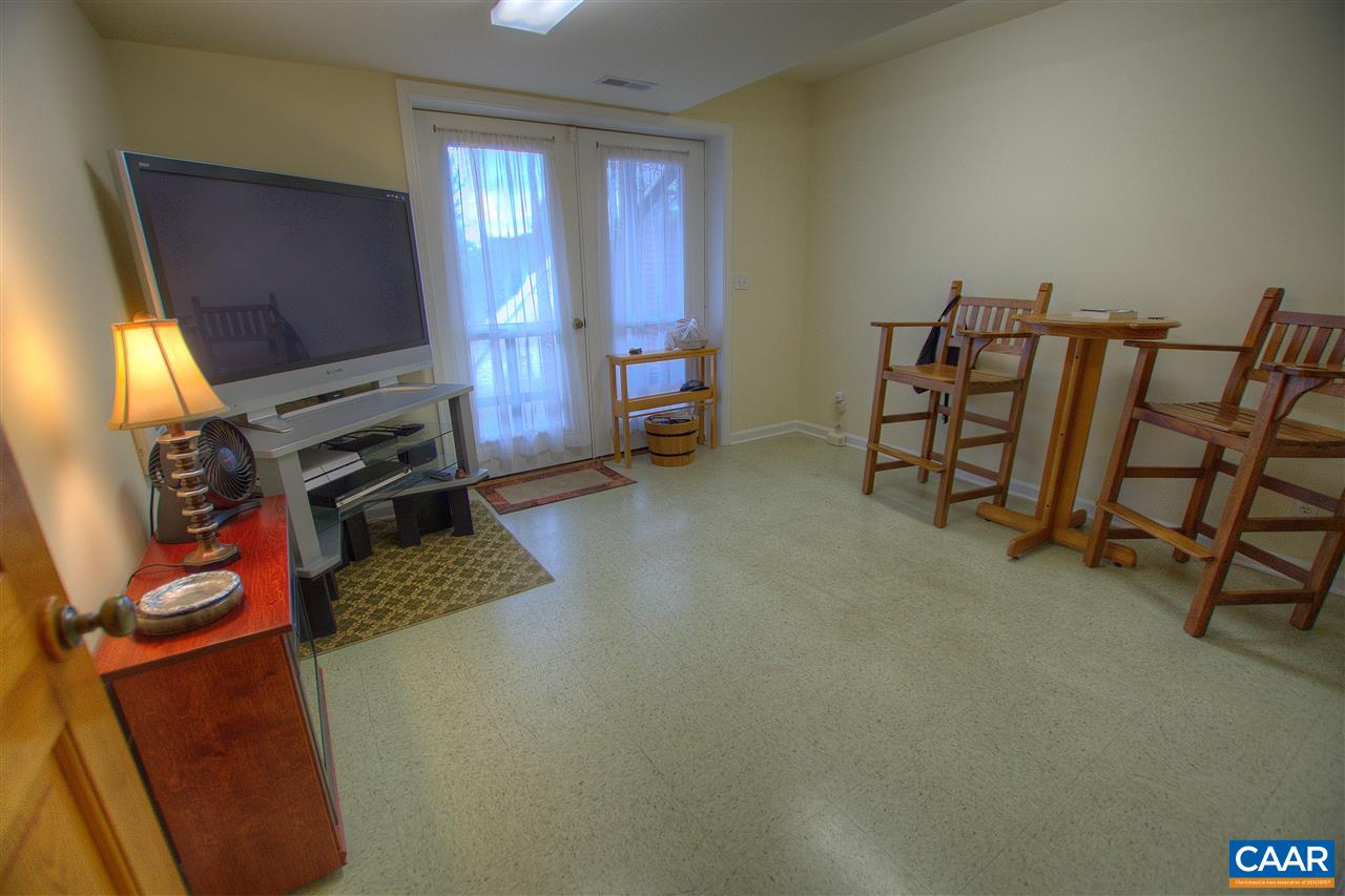 264 Twin Ridge Lane Afton, VA 22920 - Photo 31 of 49 a living room with furniture and a flat screen tv