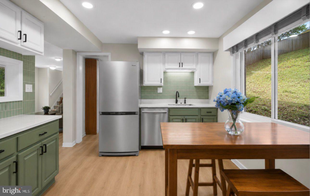 413 Waterford Road Silver Spring, MD 20901 - Photo 2 of 3 Modern kitchen with serene views.