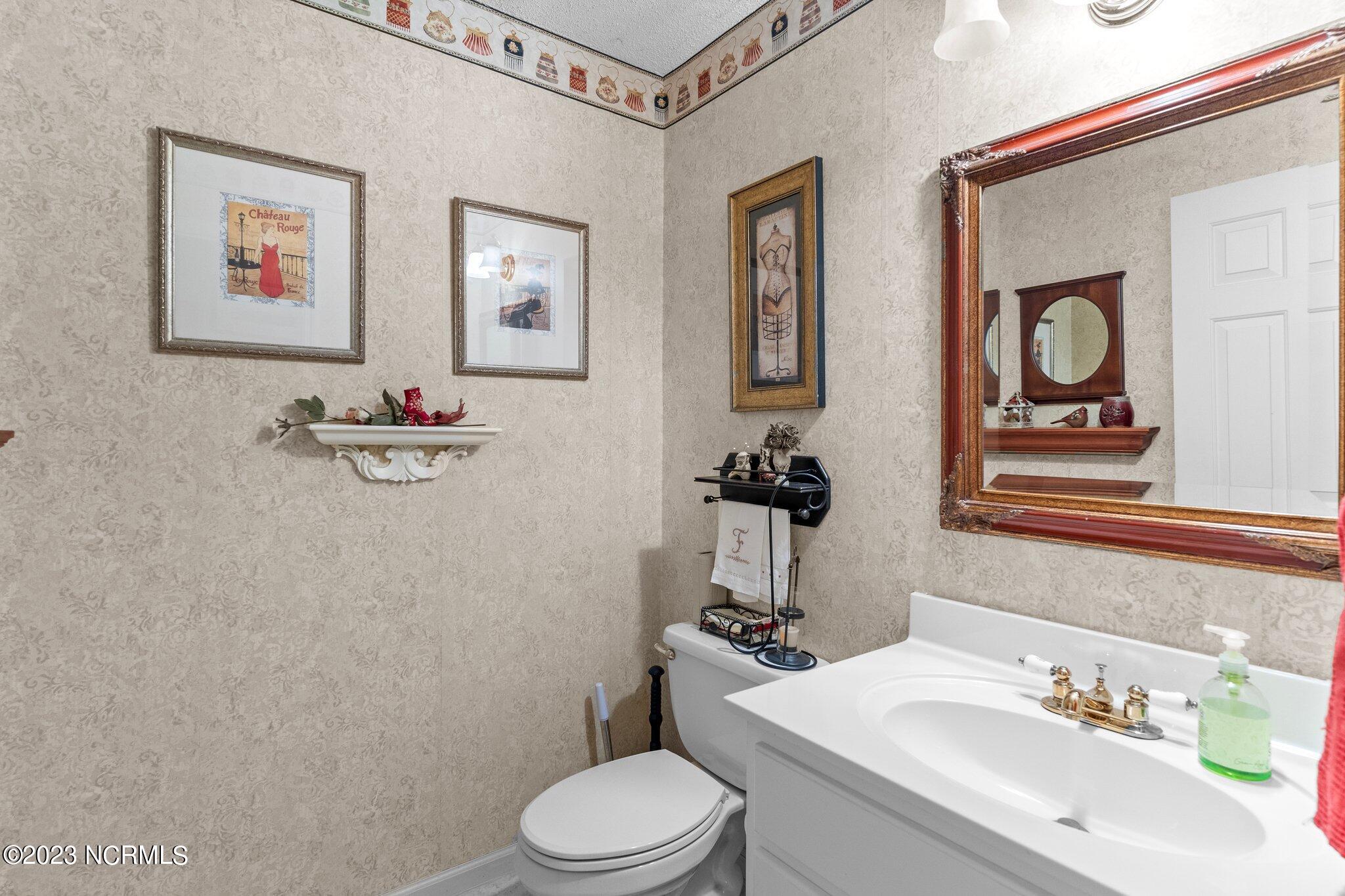 209 Rice Mill Circle Sunset Beach, NC 28468 - Photo 25 of 53 half bath