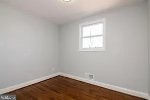 a view of hallway with furniture