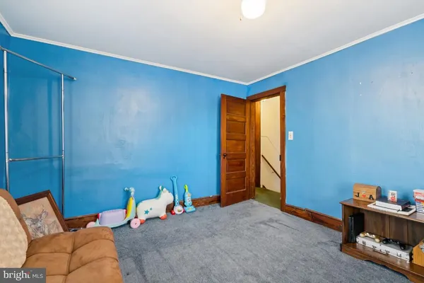 a bedroom with furniture and a bed