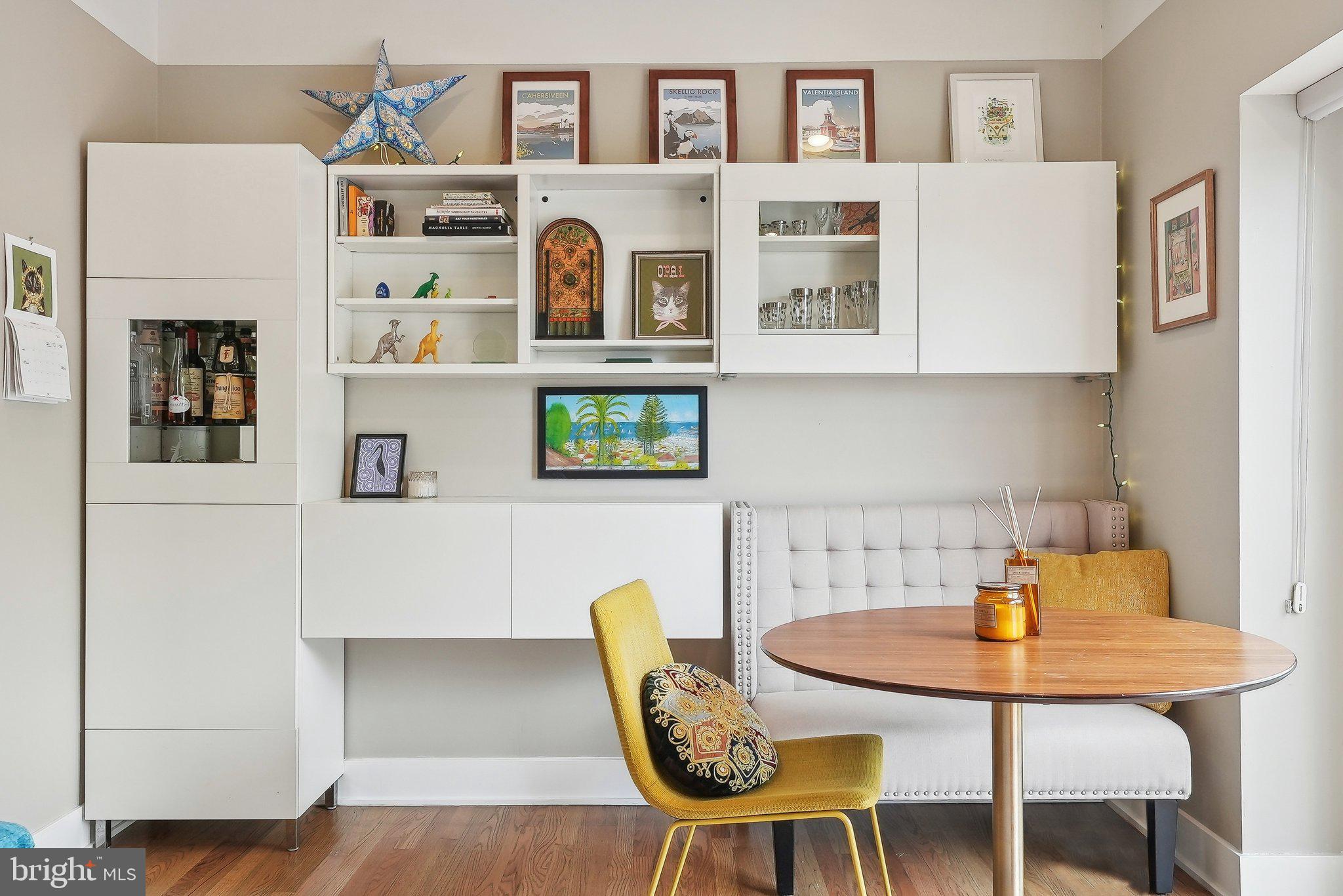 2630 Adams Mill Road Northwest, Unit 303 Washington, DC 20009 - Photo 9 of 18 a table and chairs in a kitchen