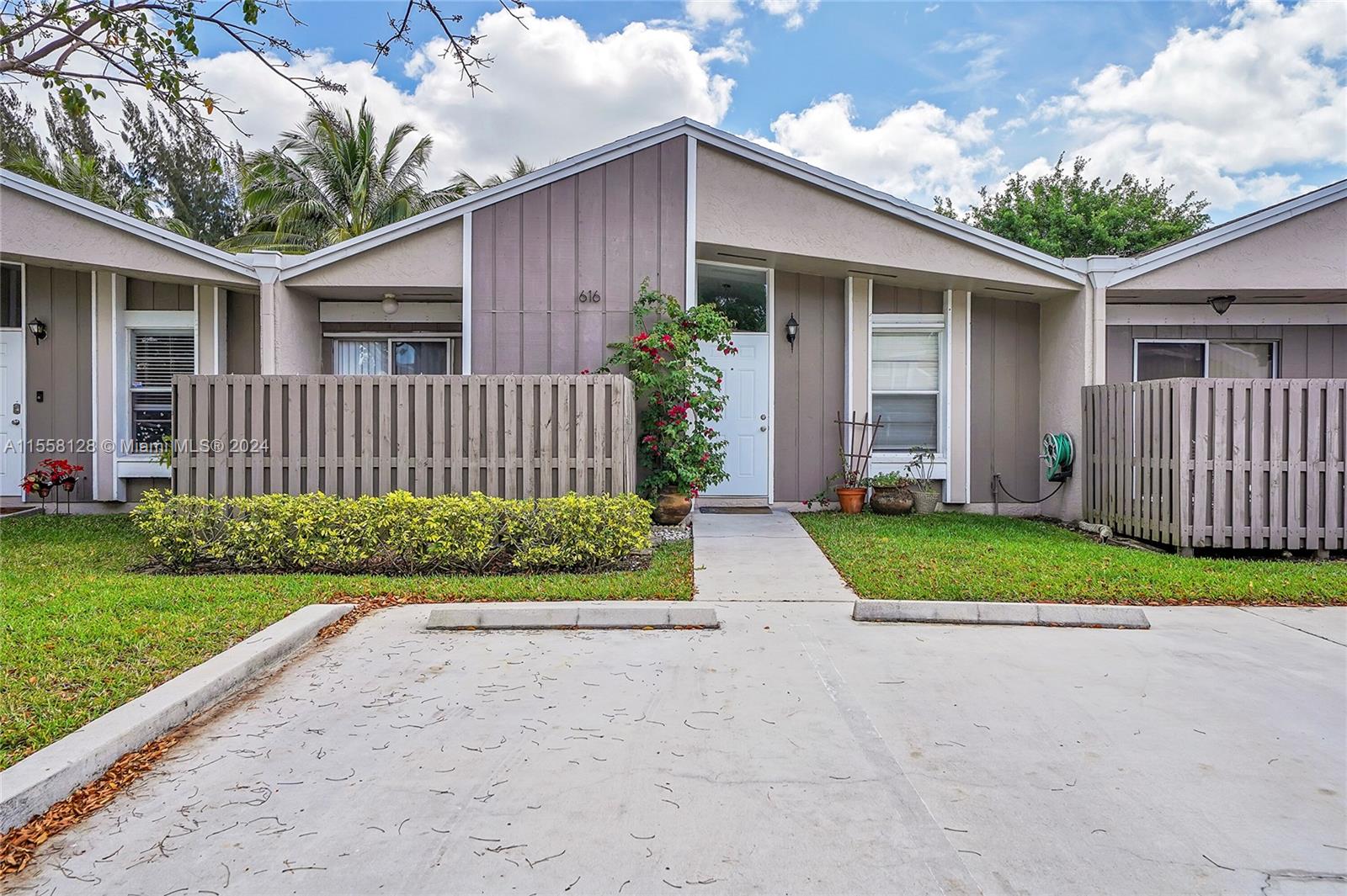 a view of a house with a back yard