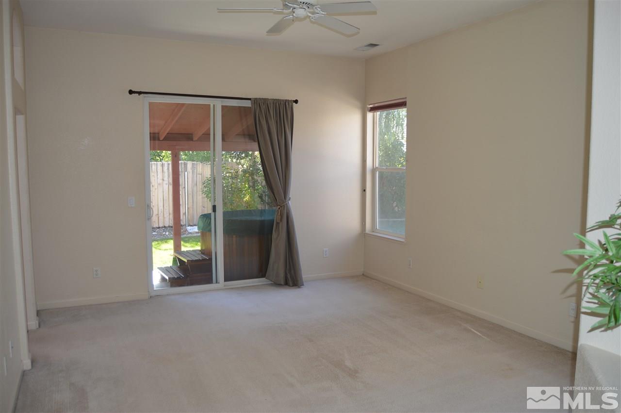 1170 Broadview Court Reno, NV 89521 - Photo 11 of 25 an empty room with windows