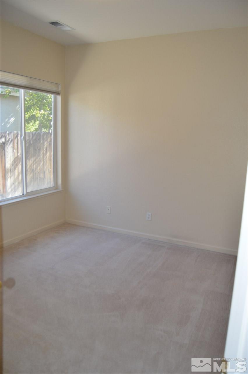 1170 Broadview Court Reno, NV 89521 - Photo 15 of 25 an empty room with windows