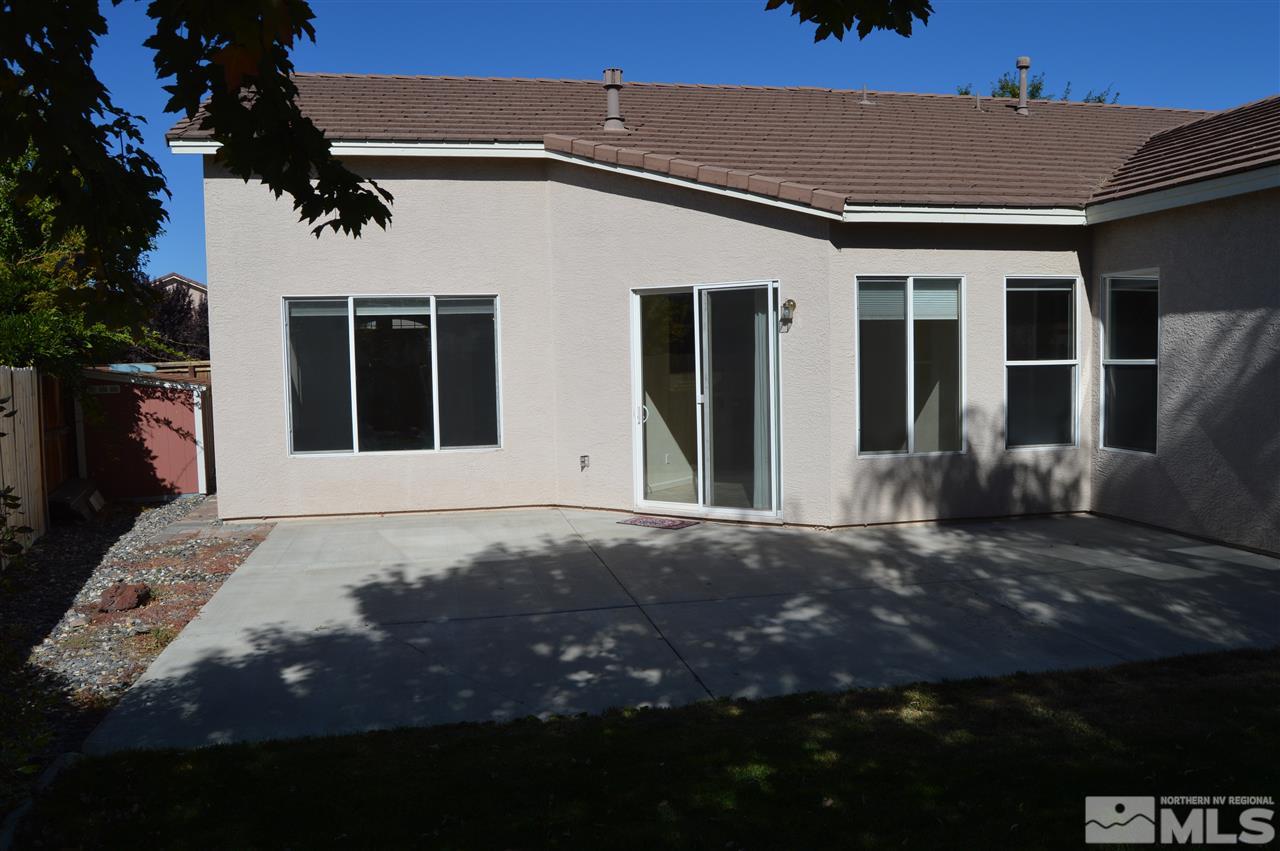 1170 Broadview Court Reno, NV 89521 - Photo 17 of 25 front view of a house with a yard