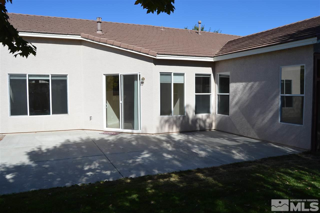 1170 Broadview Court Reno, NV 89521 - Photo 18 of 25 front view of a house with a yard