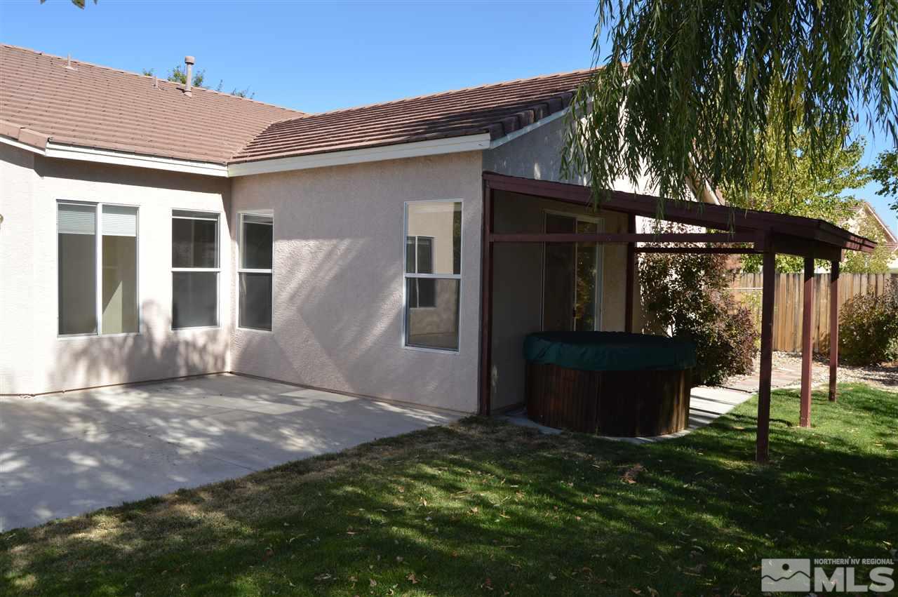1170 Broadview Court Reno, NV 89521 - Photo 19 of 25 a view of house with backyard