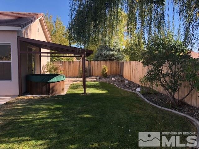1170 Broadview Court Reno, NV 89521 - Photo 21 of 25 a backyard of a house with lots of green space