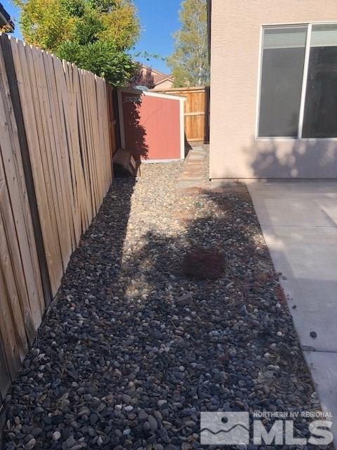 1170 Broadview Court Reno, NV 89521 - Photo 23 of 25 a view of a backyard with pathway