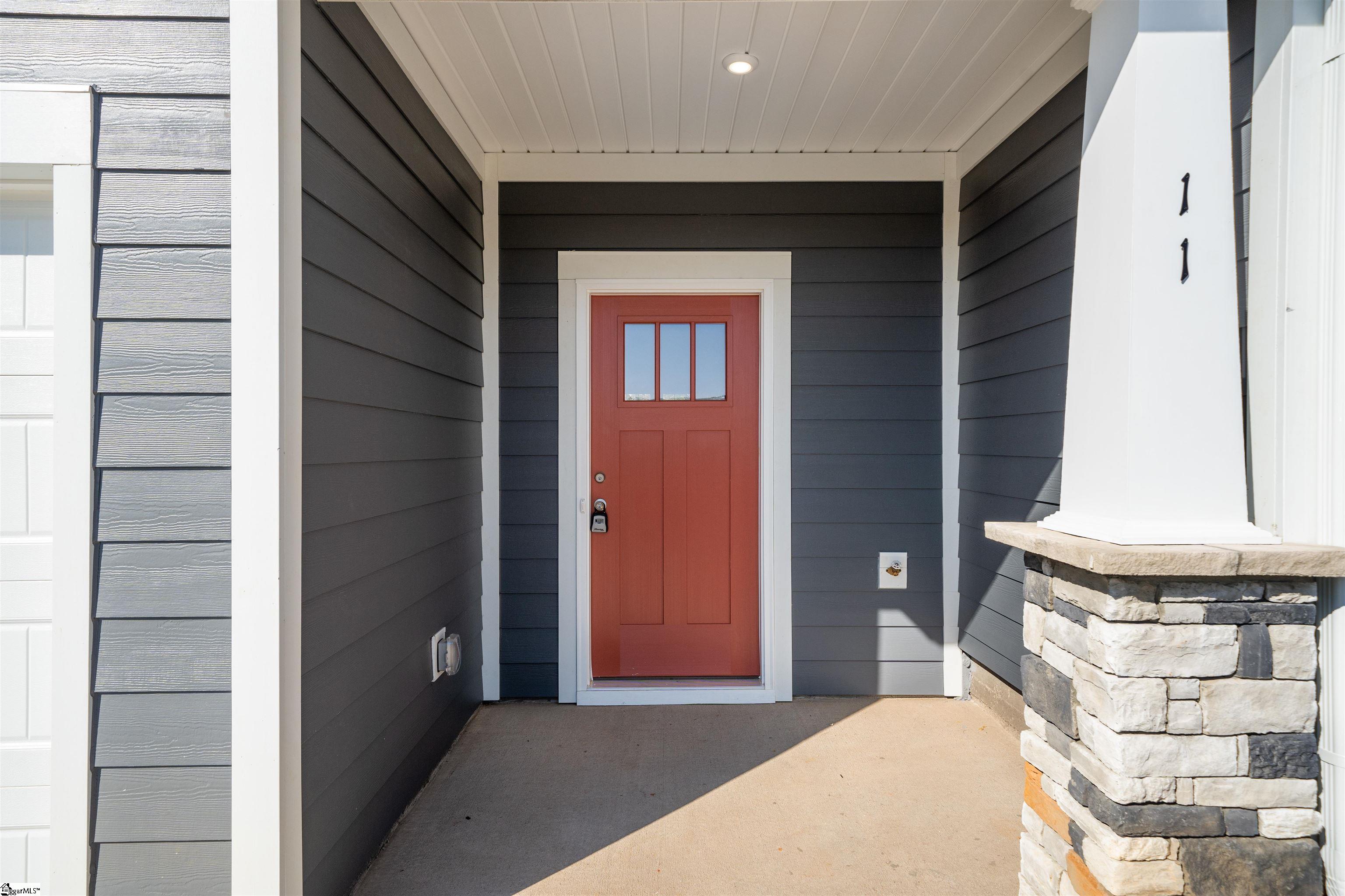 Stone Wrapped Column Front Porch. *Model Home-For illustrative purposes only*