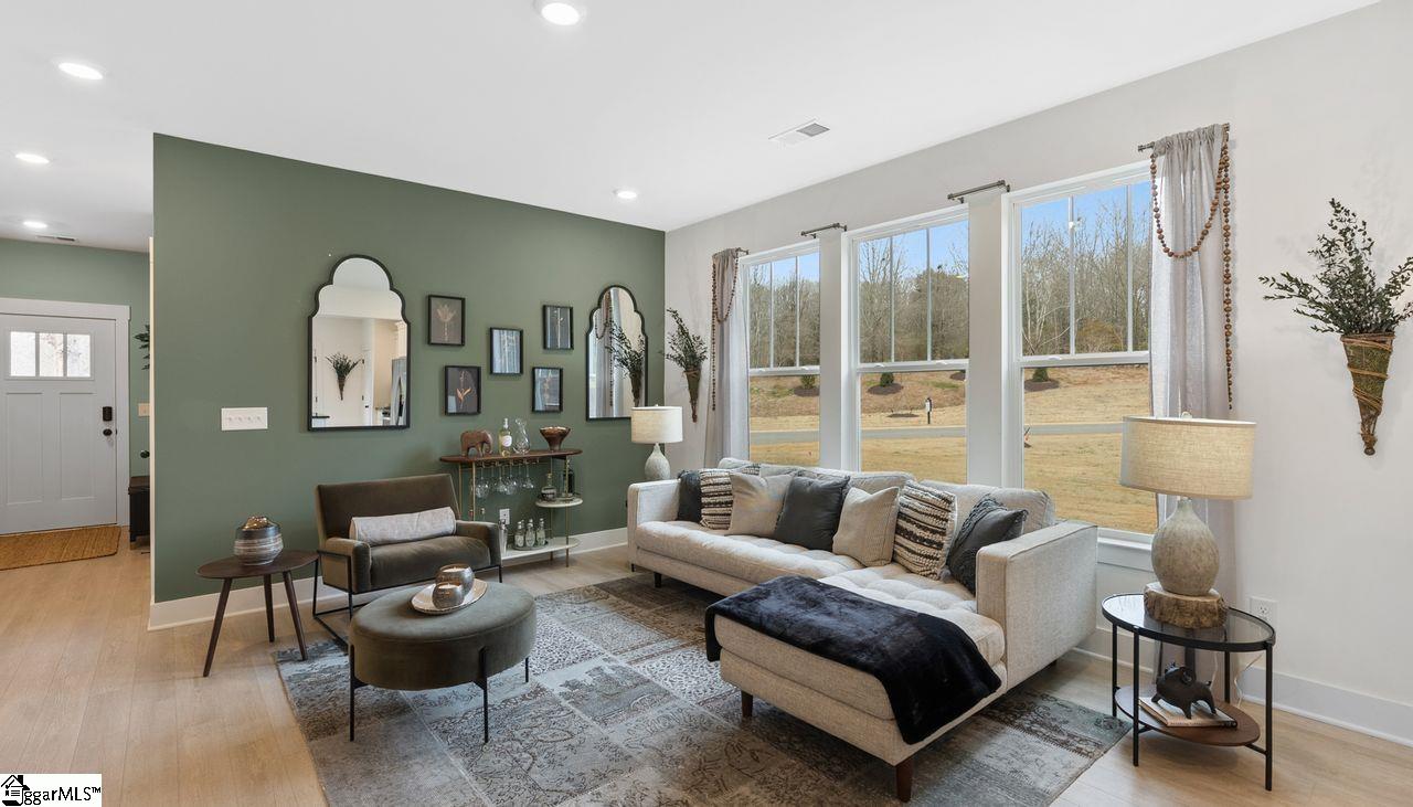 Oversized family room that's perfect for gathering. *Model Home-For illustrative purposes only*