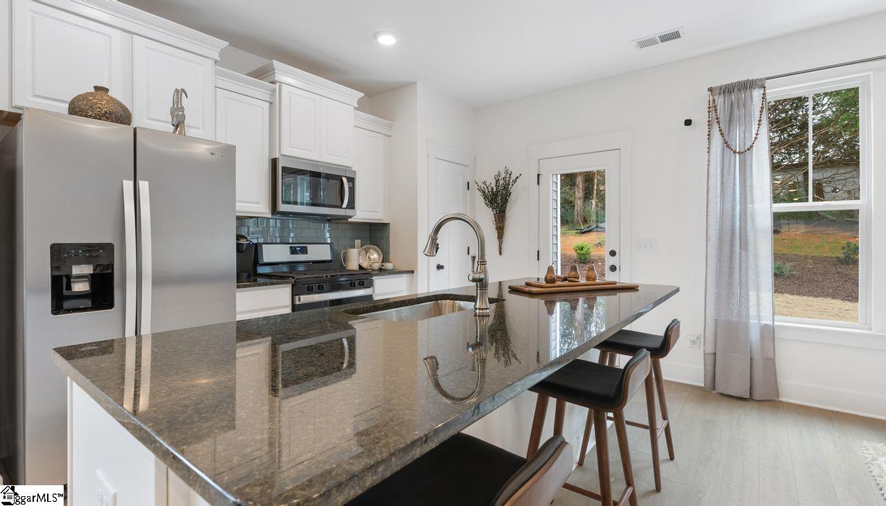 1376 Maplesmith Way Moore, SC 29369 - Photo 9 of 19 Granite Countertops & Stainless Steel Appliances. *Model Home-For illustrative purposes only*