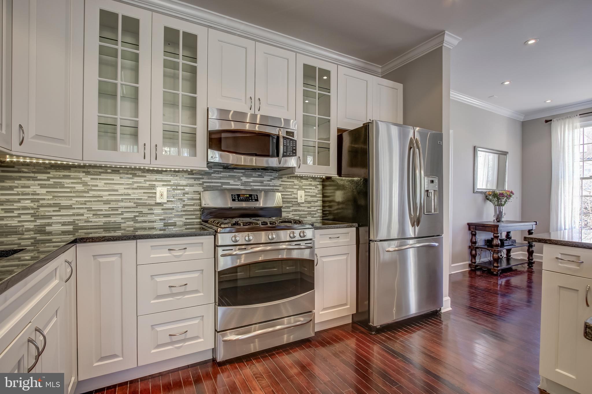 8445 Bells Ridge Terrace Potomac, MD 20854 - Photo 10 of 30 42" Upper Cabinets With Glass Display Doors