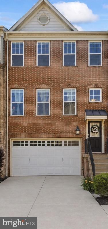 25333 Wakestone Terrace Chantilly, VA 20152 - Photo 1 of 109 Charming brick facade with modern appeal.