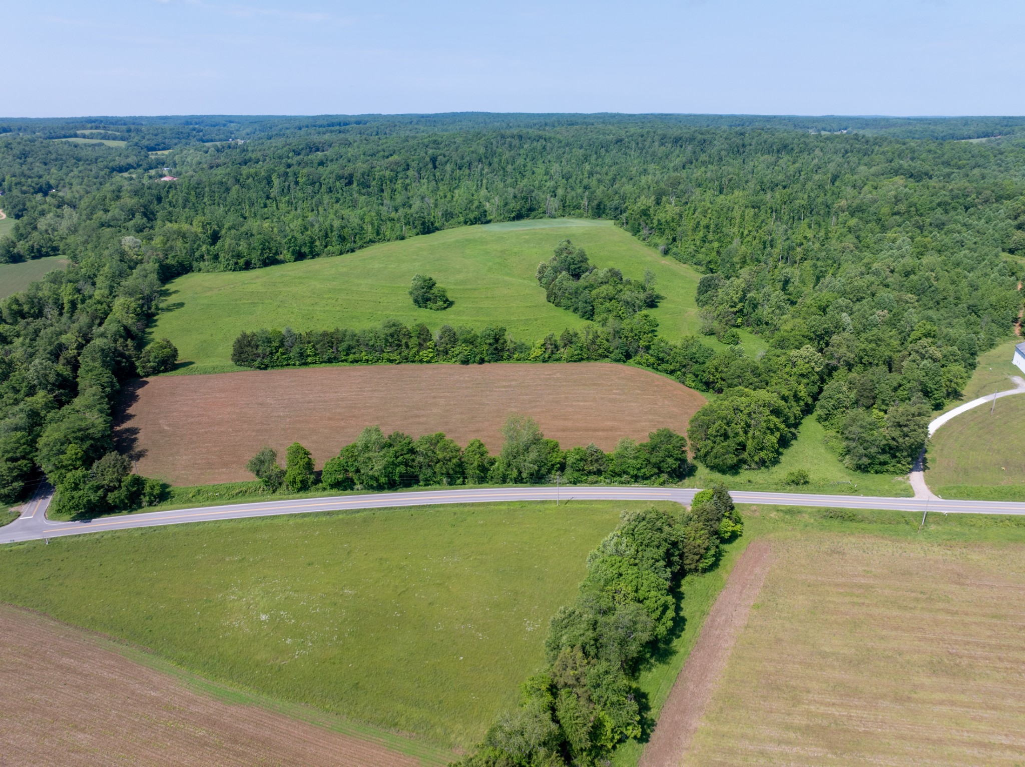 3 Highway 49 Vanleer, TN 37181 - Photo 17 of 26 an aerial view of a house with a garden and yard