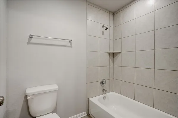 an empty room with staircase