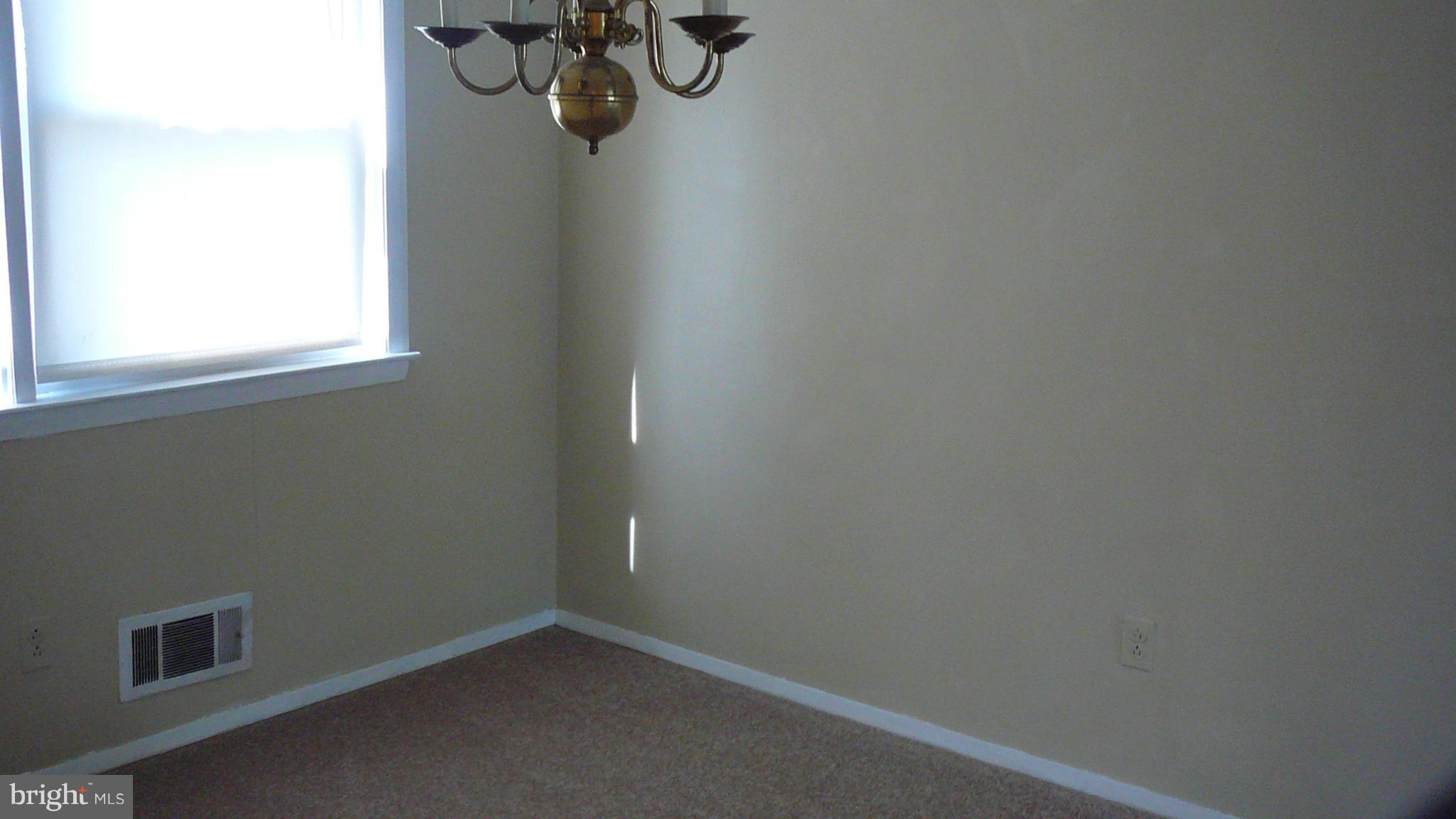 2127 Southorn Road Baltimore, MD 21220 - Photo 4 of 11 a view of a small space with a window