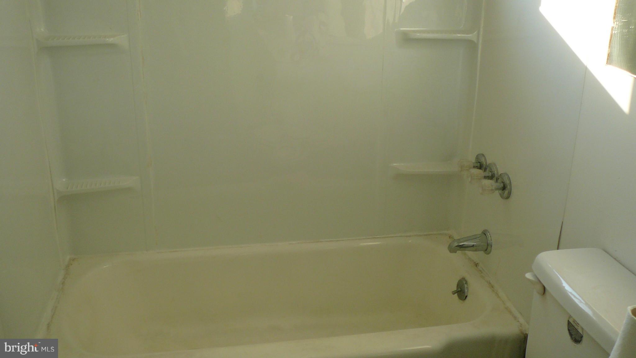 2127 Southorn Road Baltimore, MD 21220 - Photo 8 of 11 a bathroom with a bathtub