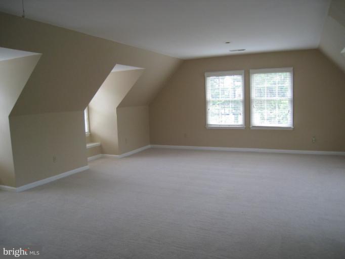 10118 Colvin Run Road Great Falls, VA 22066 - Photo 15 of 26 an empty room with a window
