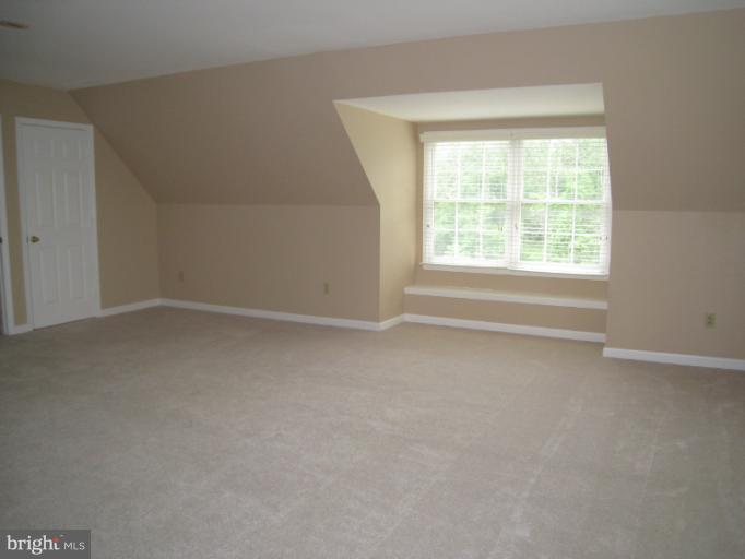 10118 Colvin Run Road Great Falls, VA 22066 - Photo 22 of 26 an empty room with a window