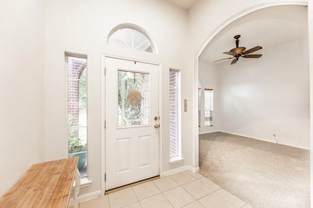 an empty room with windows