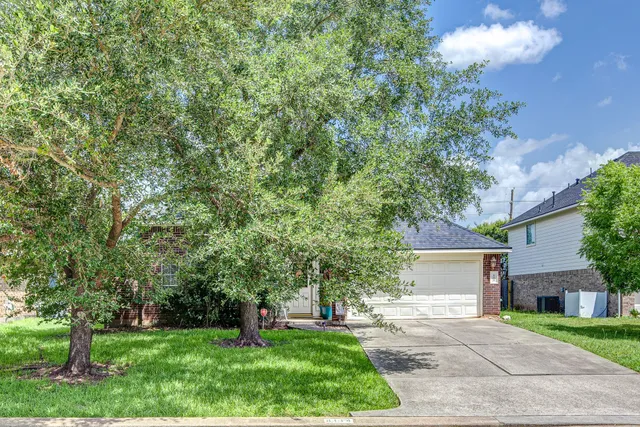 a view of a chair and table in the patio