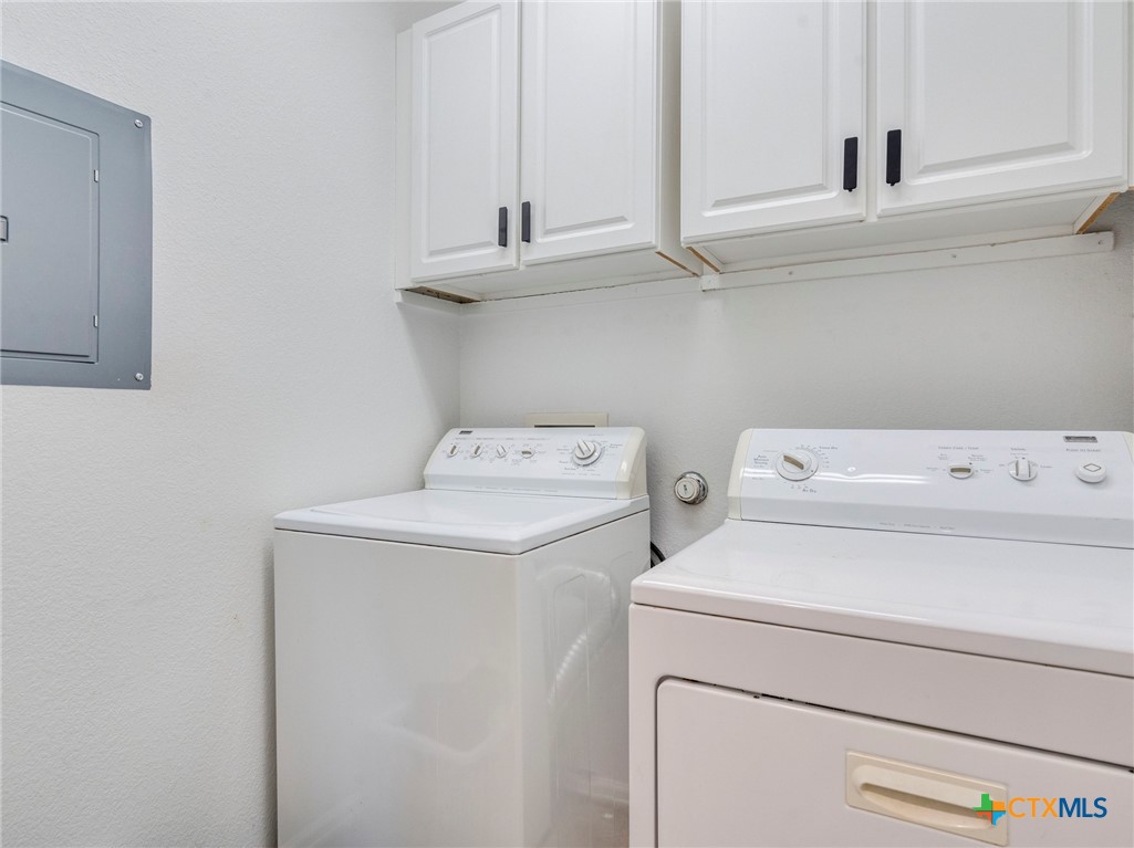 125 Sweet Gum Drive Kyle, TX 78640 - Photo 27 of 31 a utility room with dryer and washer