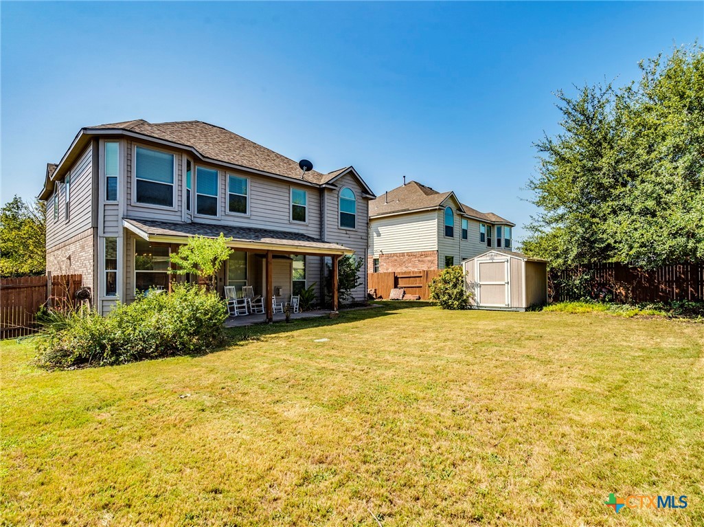 125 Sweet Gum Drive Kyle, TX 78640 - Photo 30 of 31 a front view of a house with a yard