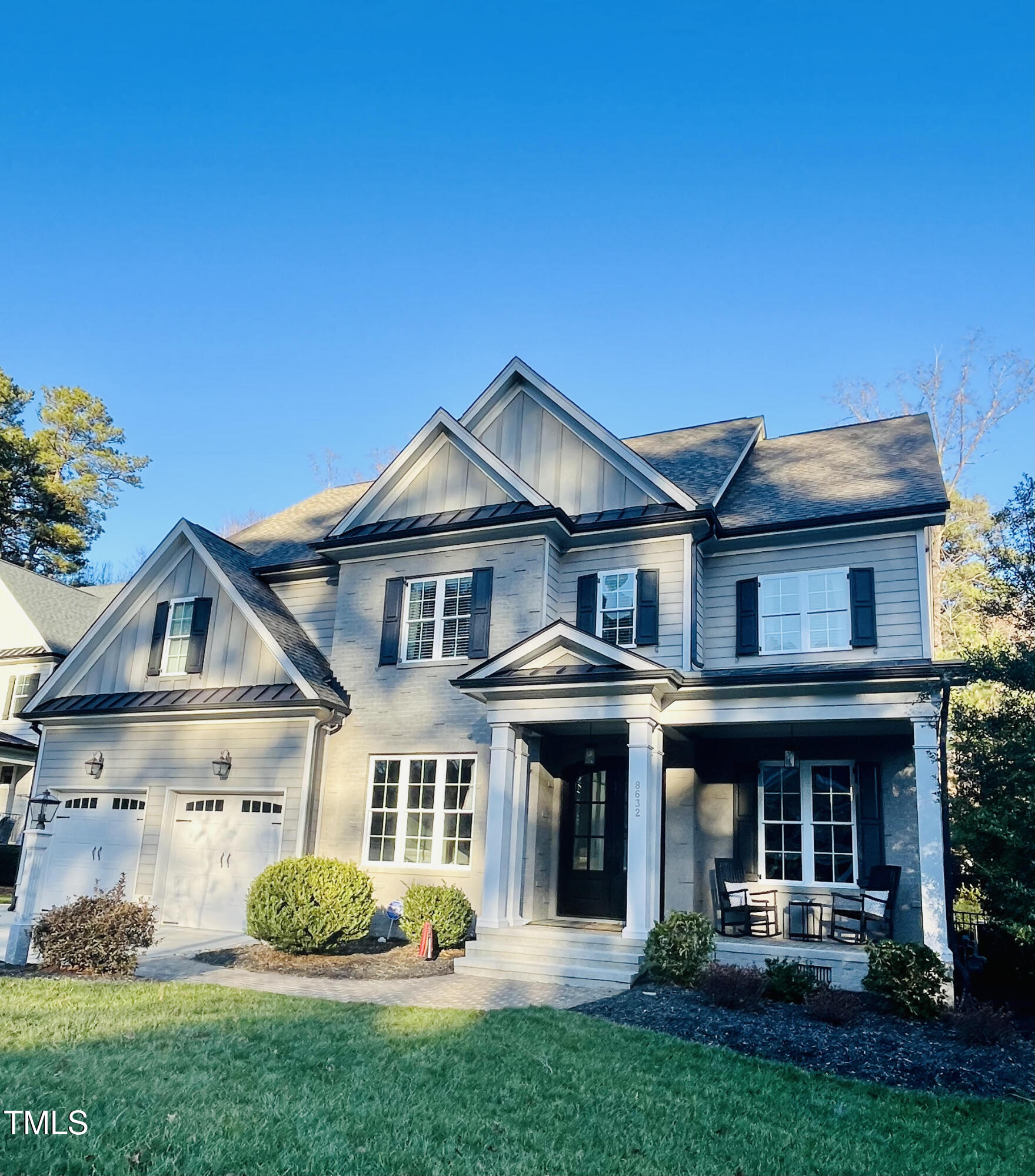 8632 Wapello Lane Raleigh, NC 27613 - Photo 1 of 3 a front view of a house with a yard