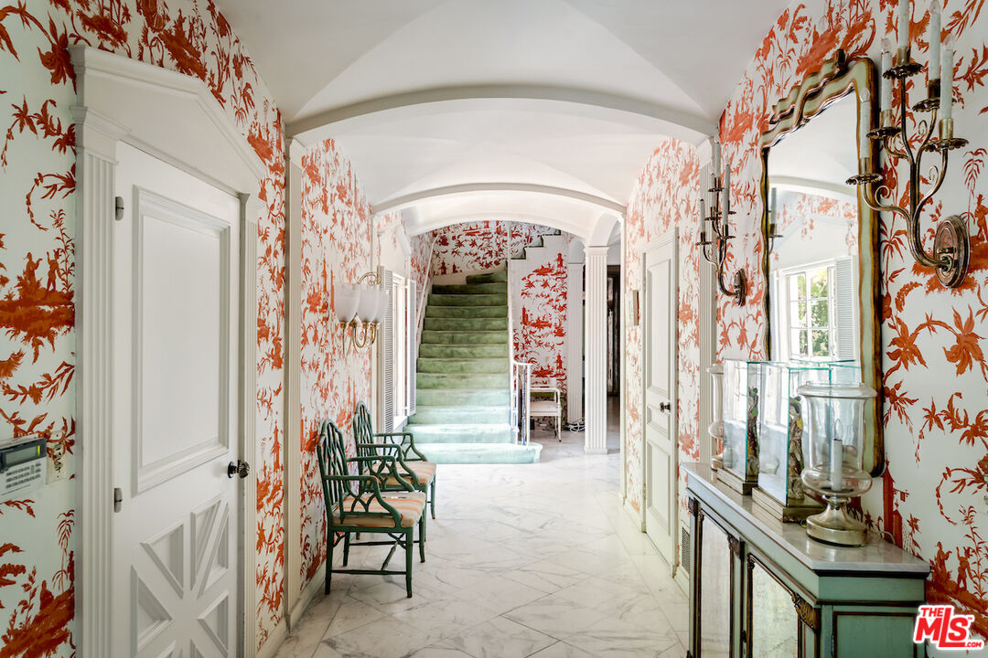 10934 Bellagio Road Los Angeles, CA 90077 - Photo 15 of 52 a view of a entryway with furniture