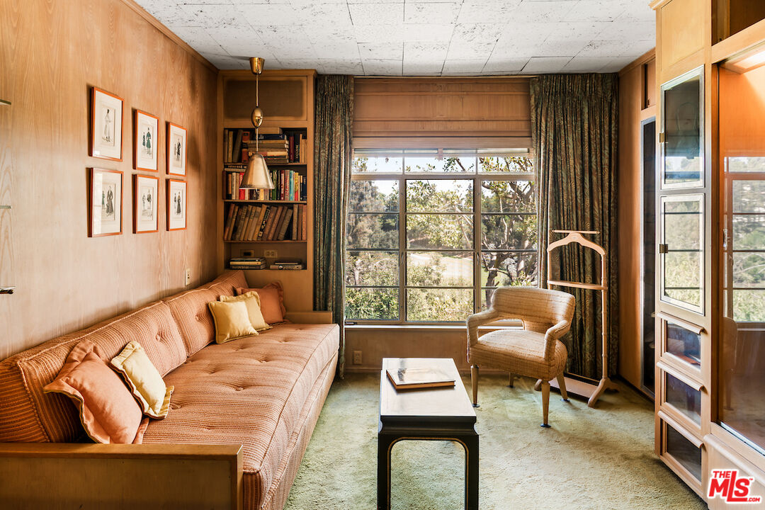 10934 Bellagio Road Los Angeles, CA 90077 - Photo 35 of 52 a living room with furniture and a large window