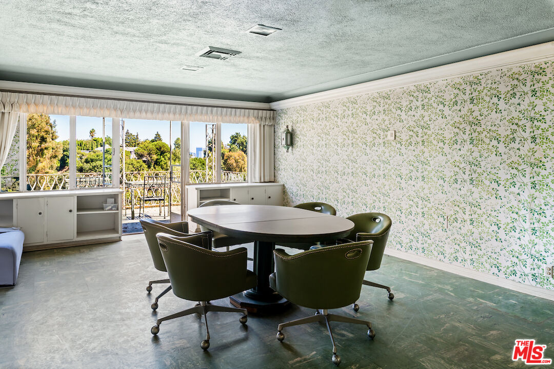 10934 Bellagio Road Los Angeles, CA 90077 - Photo 43 of 52 a view of a dining room with furniture window and outside view