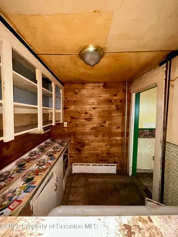 a view of kitchen with wooden floor