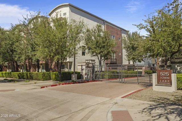 a view of a building with a street