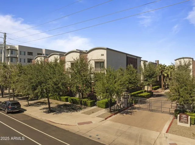 a front view of a house with yard