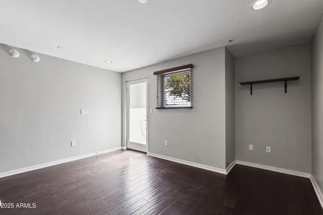 a view of entryway with wooden floor