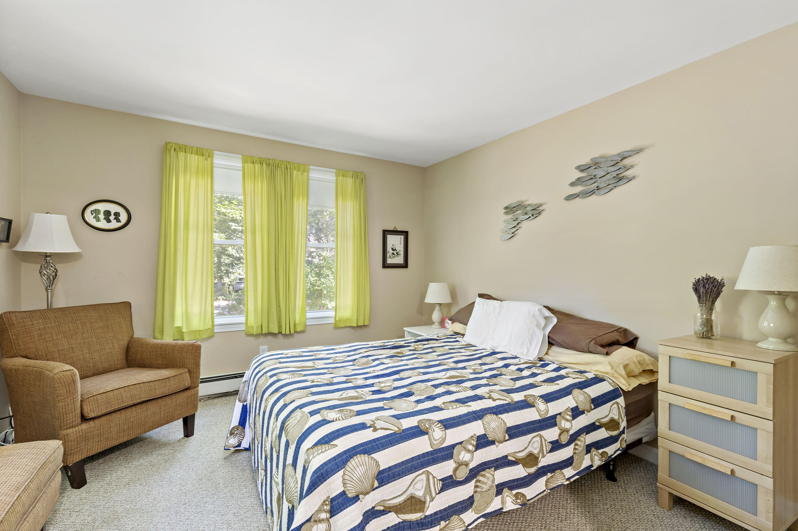 35 Whitney Road Eastham, MA 02642 - Photo 14 of 31 a bedroom with a bed and a couch