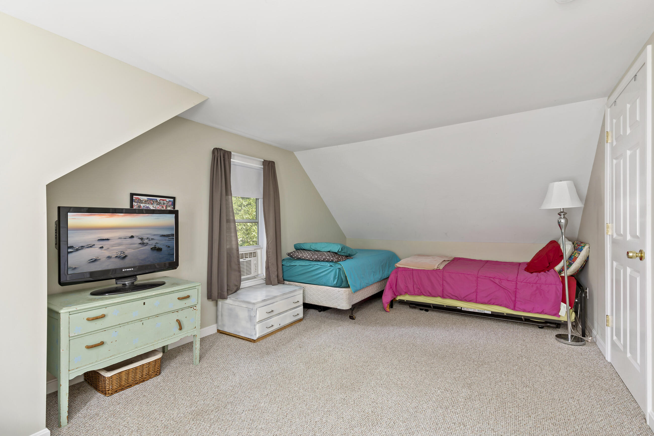 35 Whitney Road Eastham, MA 02642 - Photo 19 of 31 a living room with furniture and a flat screen tv