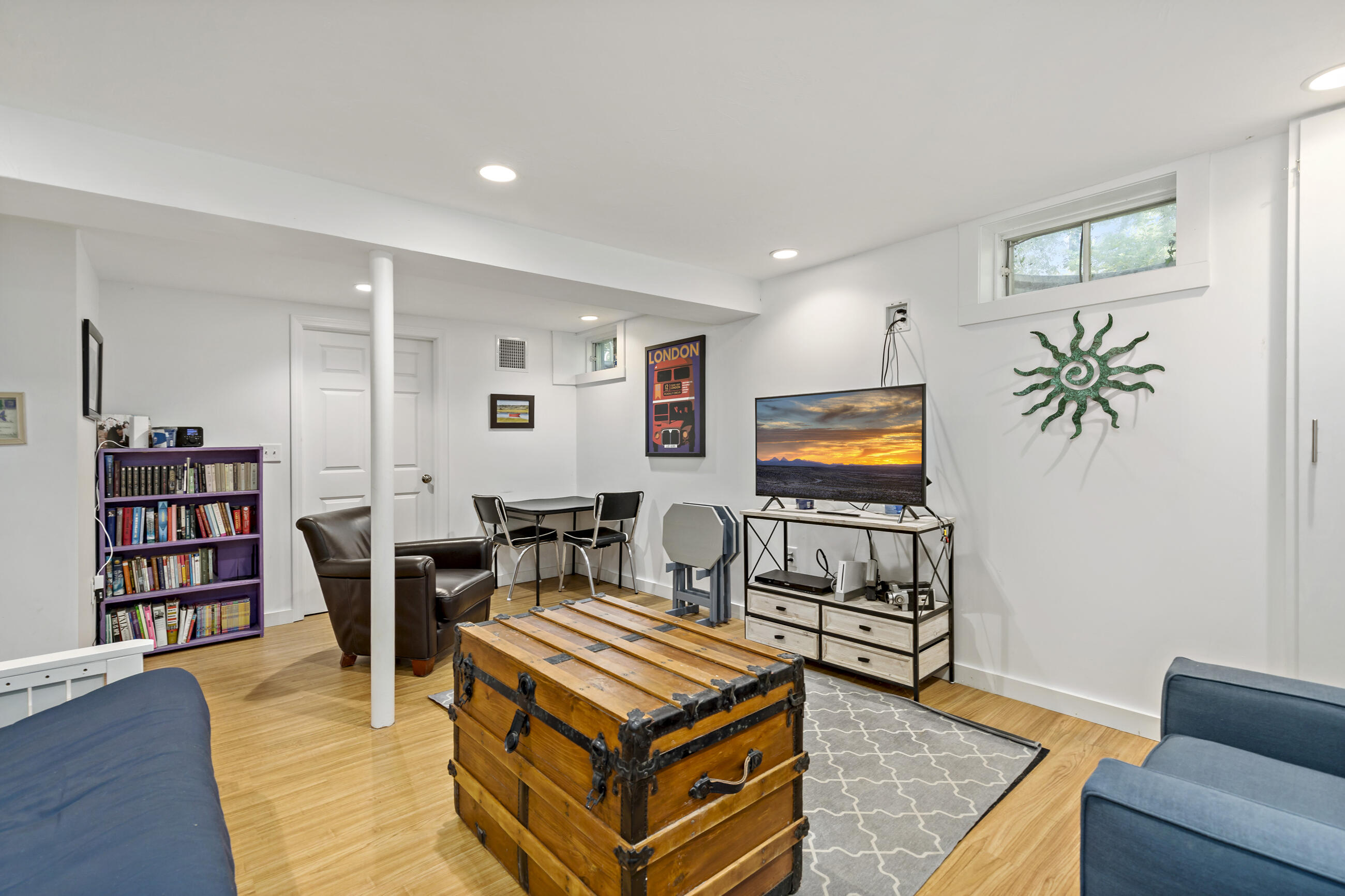 35 Whitney Road Eastham, MA 02642 - Photo 25 of 31 a living room with furniture and bookshelf